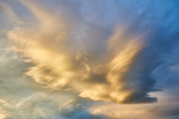Fototapeta na wymiar Nice cloudscape with sunset light