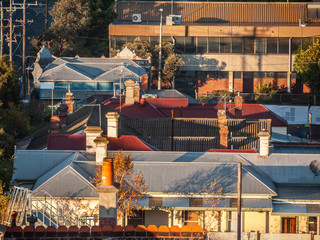 Roofs with chimney of residential houses in Melbourne's inner suburb. Footscray, VIC Australia.