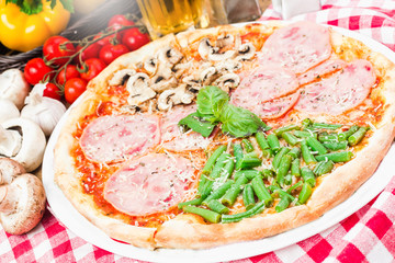 Composition with delicious pizza and ingredients close up