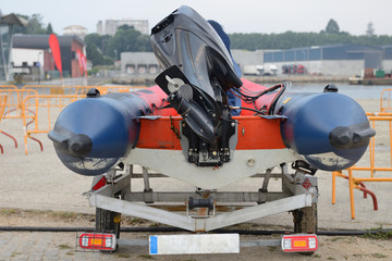 inflatable motorboat on trailer close-up rear view