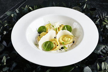 Homemade Crab Dumplings with Sour Cream Sauce and Black Truffle Top View