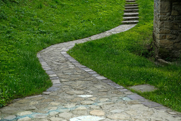 curved stone path in the garden