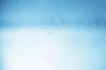 wet glass background condensate / abstract rain, drops texture on transparent glass