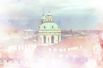 pink Prague background and red roofs / background of the blurred landscape of the czech republic, Prague, panoramic view of the red roofs of Prague