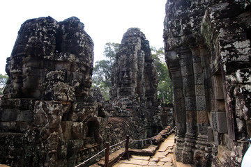Ancient stone faces  of Bayon temple, Angkor Wat, Siam Reap, Cambodia