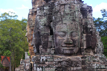 Ancient stone faces  of Bayon temple, Angkor Wat, Siam Reap, Cambodia