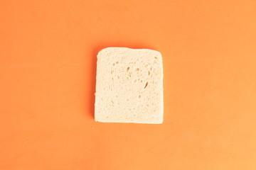 bread without rind in colorful background..