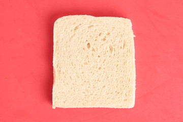 bread without rind in colorful background..