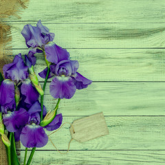 blue flowers on wooden background