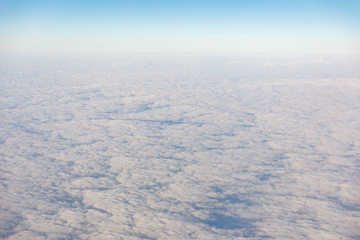 Fluffy clouds at the morning from the aircraft