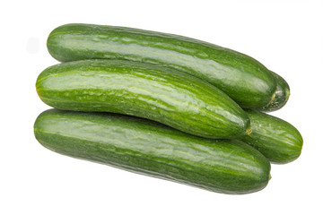 Group of five green cucumbers with flower