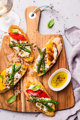 Toasts (sandwiches) with cheese, pepper and asparagus