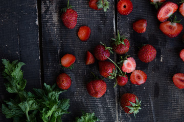 Strawberry on wooden background top view. Berries background, flat lay. Healthy food concept