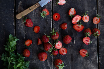 Strawberry on wooden background top view. Berries background, flat lay. Healthy food concept
