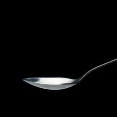 BIG SPOON ON DARK BACKGROUND