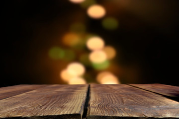 Brown table top with abstract blurred bokeh  background. Table top