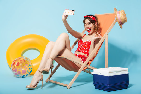 Beautiful young woman wearing swimsuit relaxing