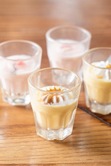 caramel custard with white cream