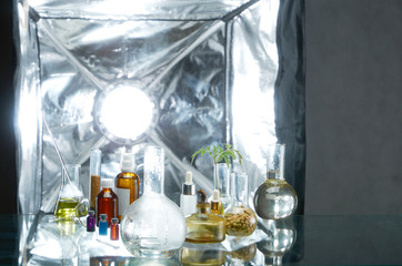 Medical jars with reagents on the background of the spotlight