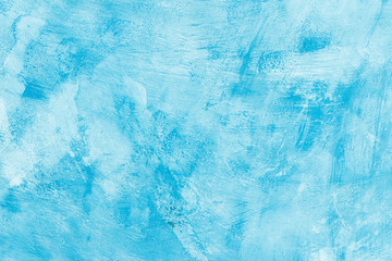 Abstract blue paint on a surface, texture art background