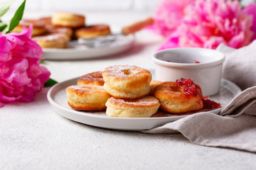 Homemade donuts with rose jam