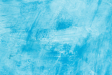 Abstract blue paint on a surface, texture art background