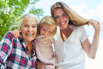 Cheerful grandmother with daughter and granddaughter