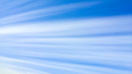 Straight line clouds as sun rays