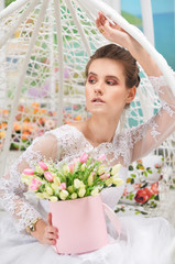 Portrait of beautiful young bride wearing wedding dress