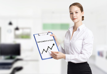 Business, technology, internet and networking concept. Young entrepreneur showing keyword:...