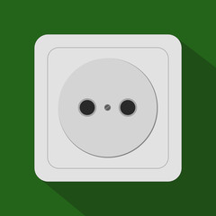 Plug socket on green wall. Socket type G UK