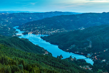 View of the Caniçada dam reservoir in Gerês, Portugal, from the viewpoint of Pedra Bela, at dusk.