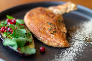 roast duck on with herbs and pomegranate seeds. summer menu