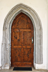 Fototapeta na wymiar entrance of an old medieval church