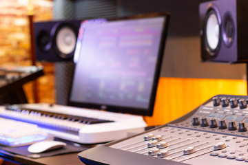 digital mixing console in home recording studio, post production, editing, broadcasting concept
