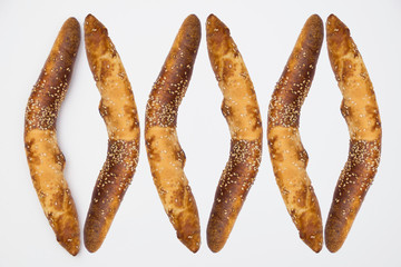  Traditional Balkan baguettes (or kifli) roll on white background.