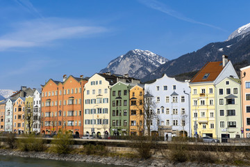 Innsbruck, Tyrol, Austria. Colored houses on the Inn River in Innsbruck. Colored houses in Innsbruck.