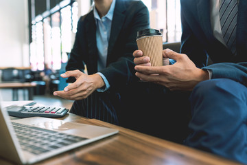 business people and coworker colleagues discussing explanations about week working plan project cooperating in modern coworking office.