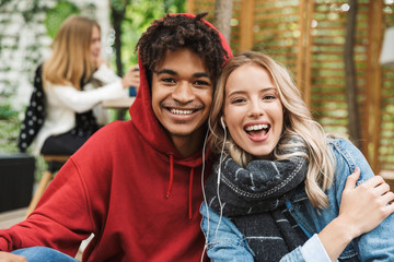 Happy young multhiethnic couple spending time