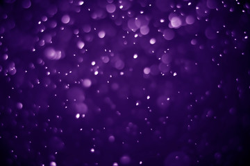 Obraz premium Bokeh purple proton background abstract