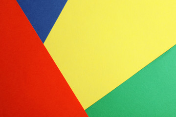 Colorful paper sheets as background, top view