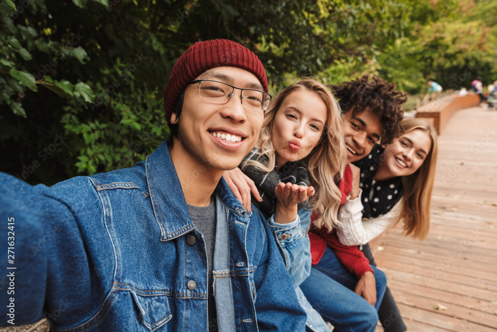 Poster Group if cheerful multiethnic friends teenagers