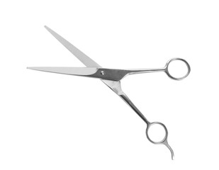 Pair of sharp hairdresser's scissors on white background