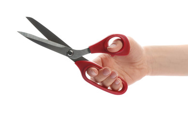 Woman holding scissors on white background, closeup