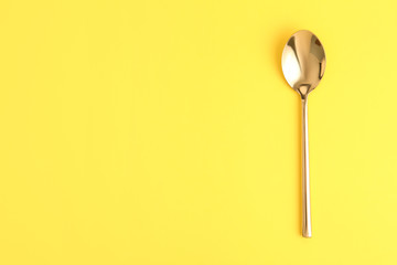 Clean tea spoon and space for text on color background, top view - obrazy, fototapety, plakaty