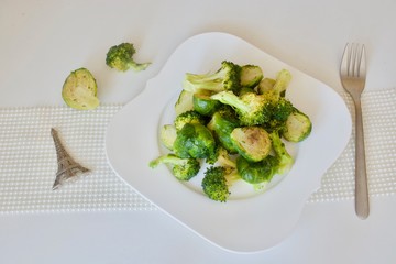 Tasty baked green broccoli and brussels cabbage. 