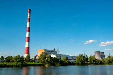 Fototapeta na wymiar Stop warming. Industrial thermal power plant and energy of ecology