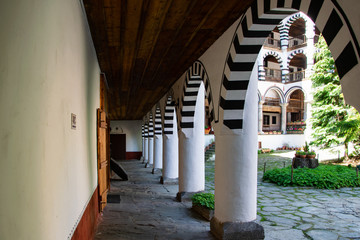 Fototapeta na wymiar A part of the orthodox Rila monastery, Bulgaria. Architectural arch style