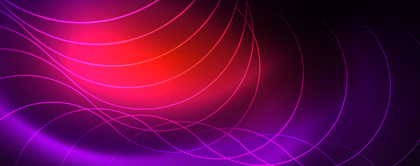 Shiny neon lights, dark abstract background with blurred magic neon light curved lines