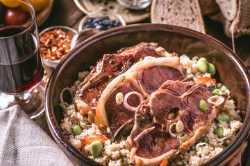 Roasted Lamb Loin Chops with Soybean and Couscous in Rustic Dish